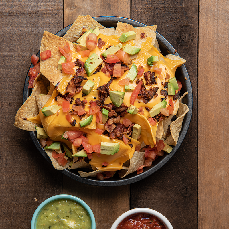 zesty nachos with beef and guacamole